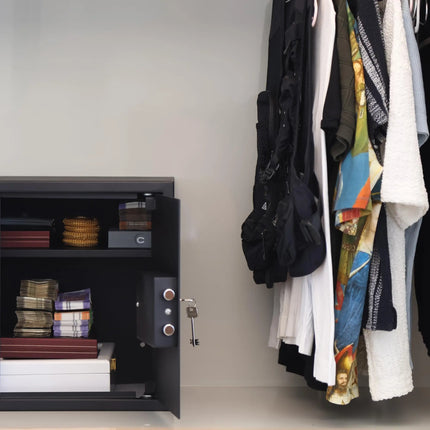 Equal safe locker interior open showing cash and passport storage space