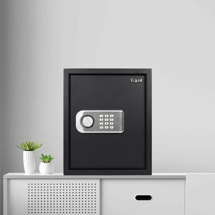 Man unlocking Equal SecureLite Pro 48L Black Digital Safe Locker with PIN code