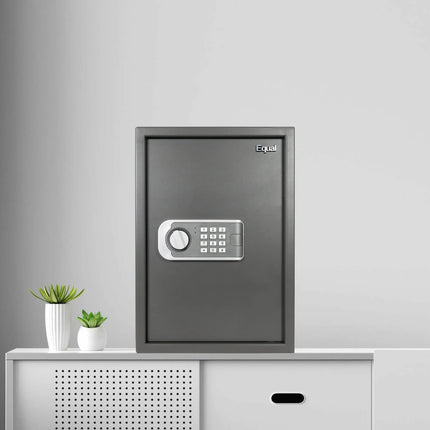 Man unlocking Equal SecureLite Pro 55L Grey Digital Safe Locker with PIN code